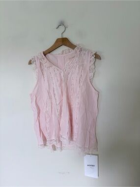 NWT a light pink linen sleeveless top with delicate white lace trim and vertical